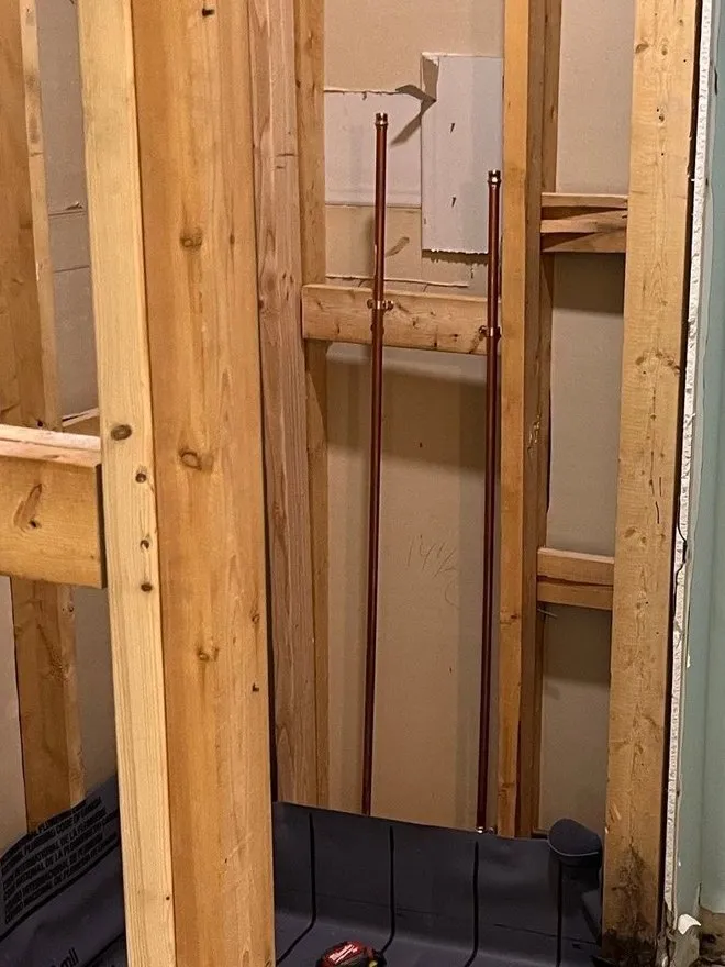 Shower stall framed, pan liner down