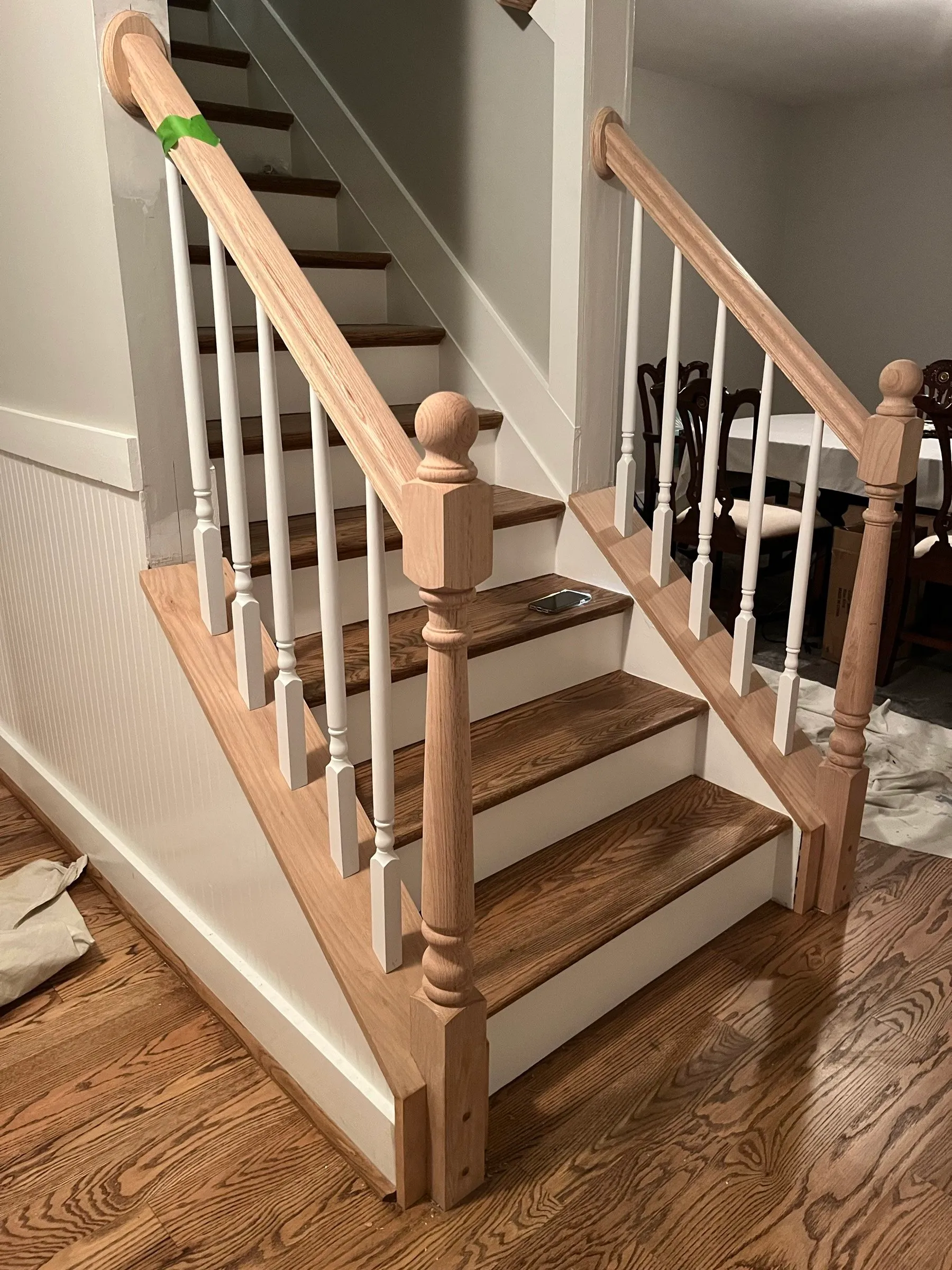 Finished oak staircase with white balusters