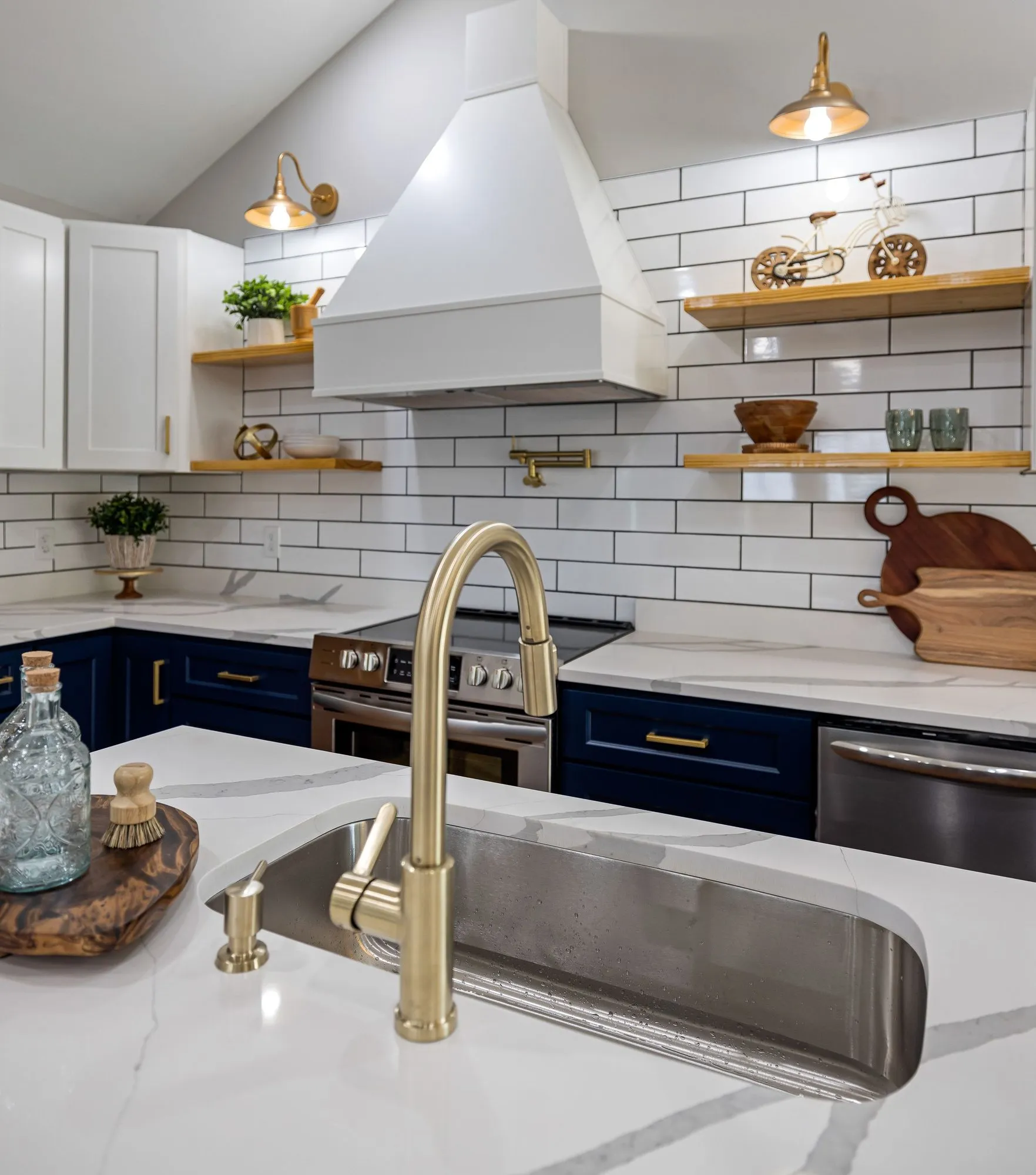 An updated kitchen with new cabinets and backsplash