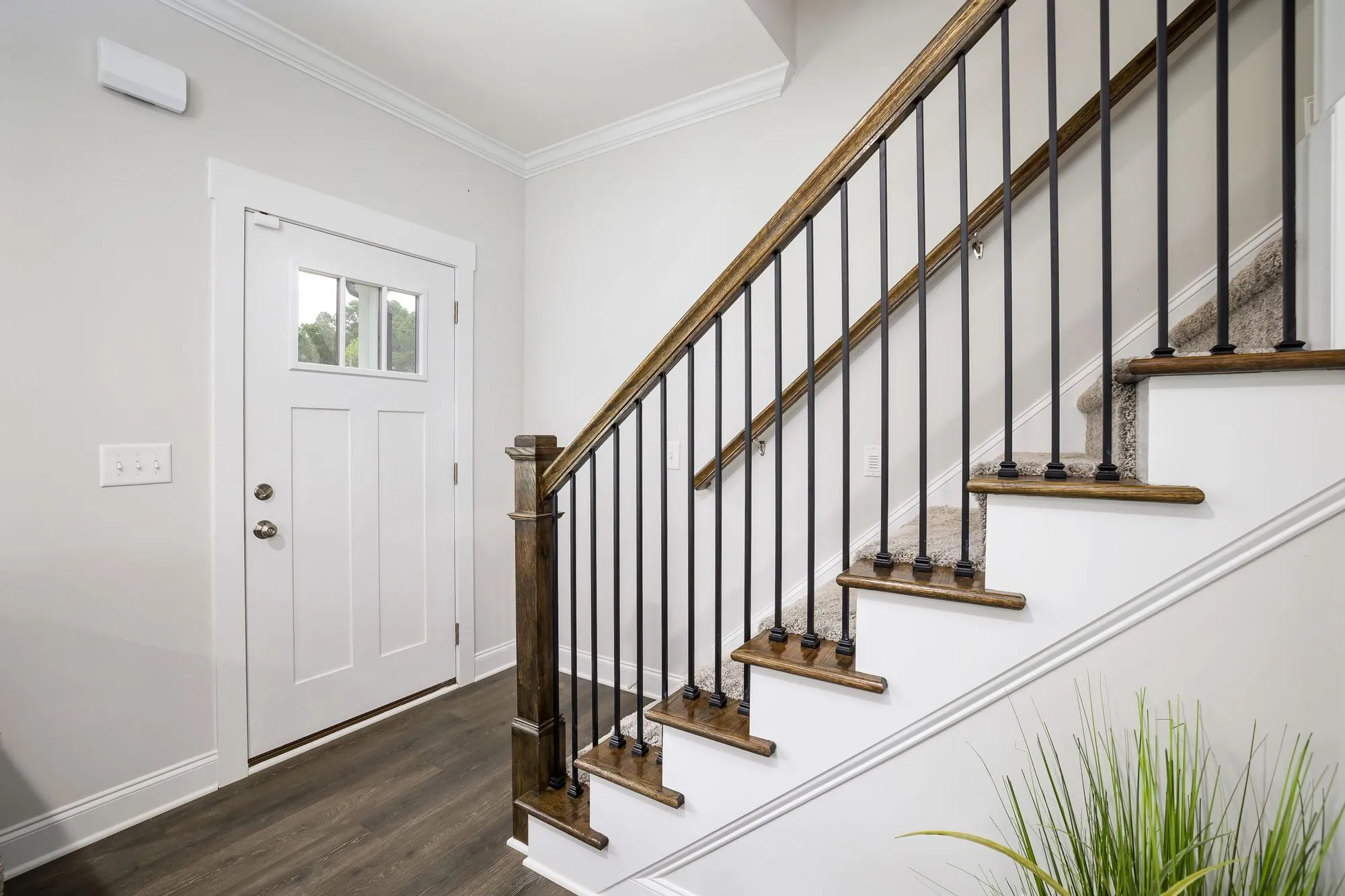 A finished staircase with balusters